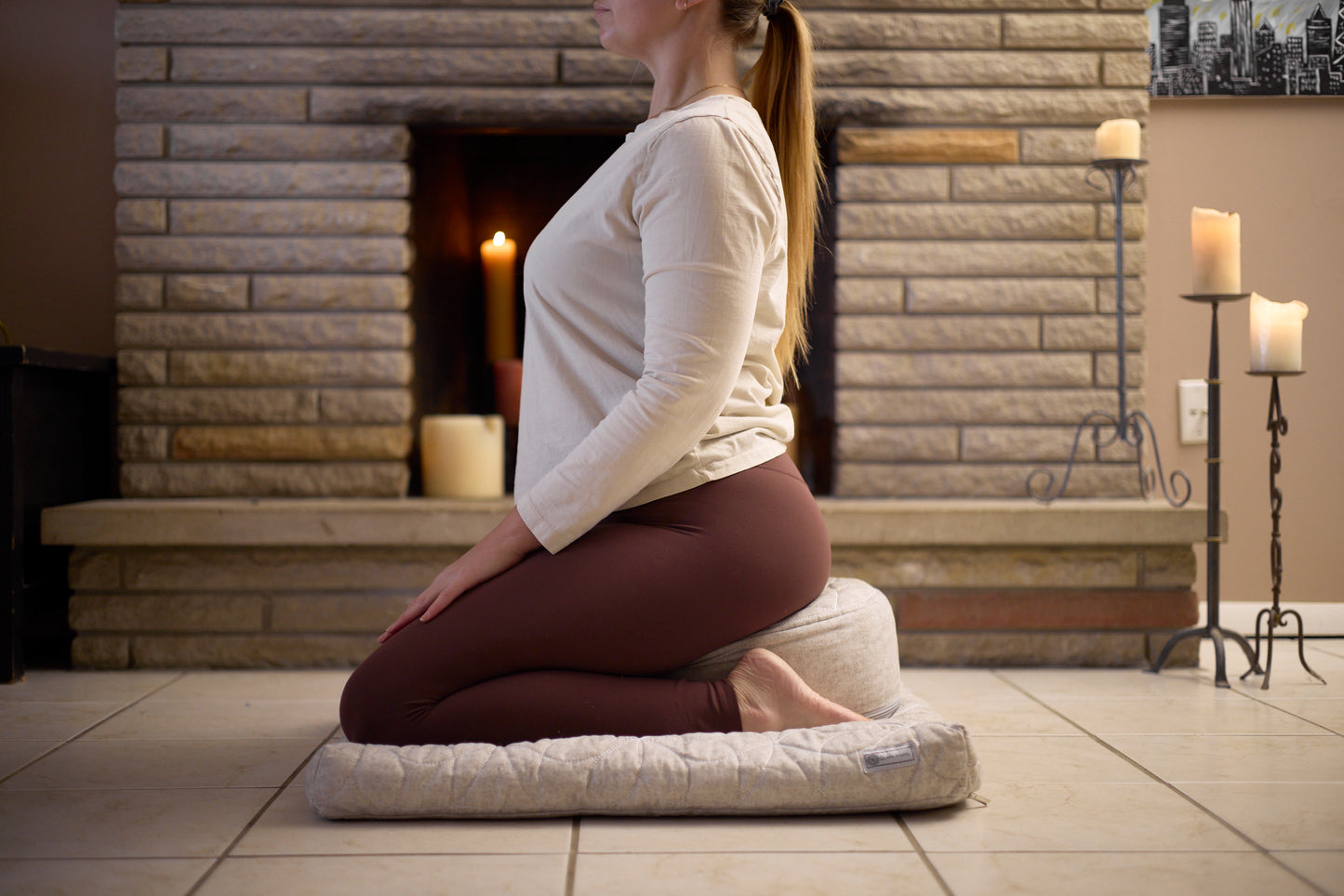 woman meditating on zafu side view